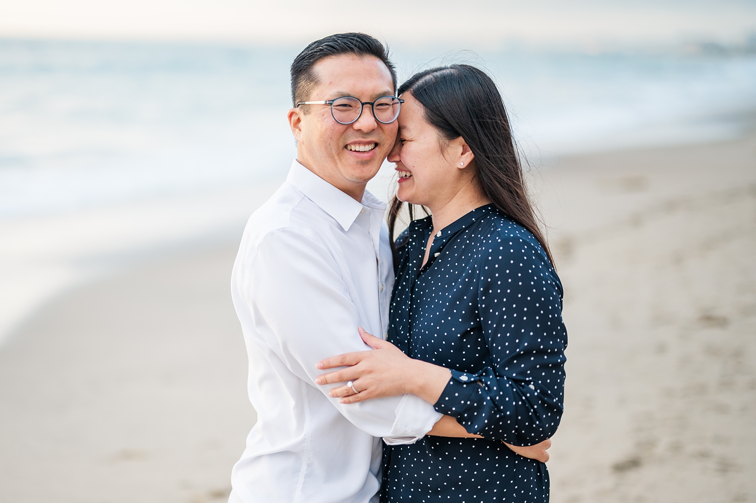 Beach Engagement Session with beautiful clouds and sunset -34.jpg