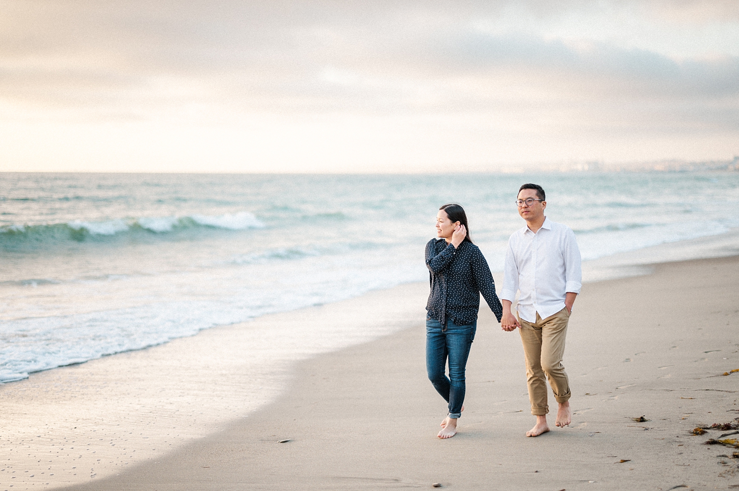 Beach Engagement Session with beautiful clouds and sunset -38.jpg