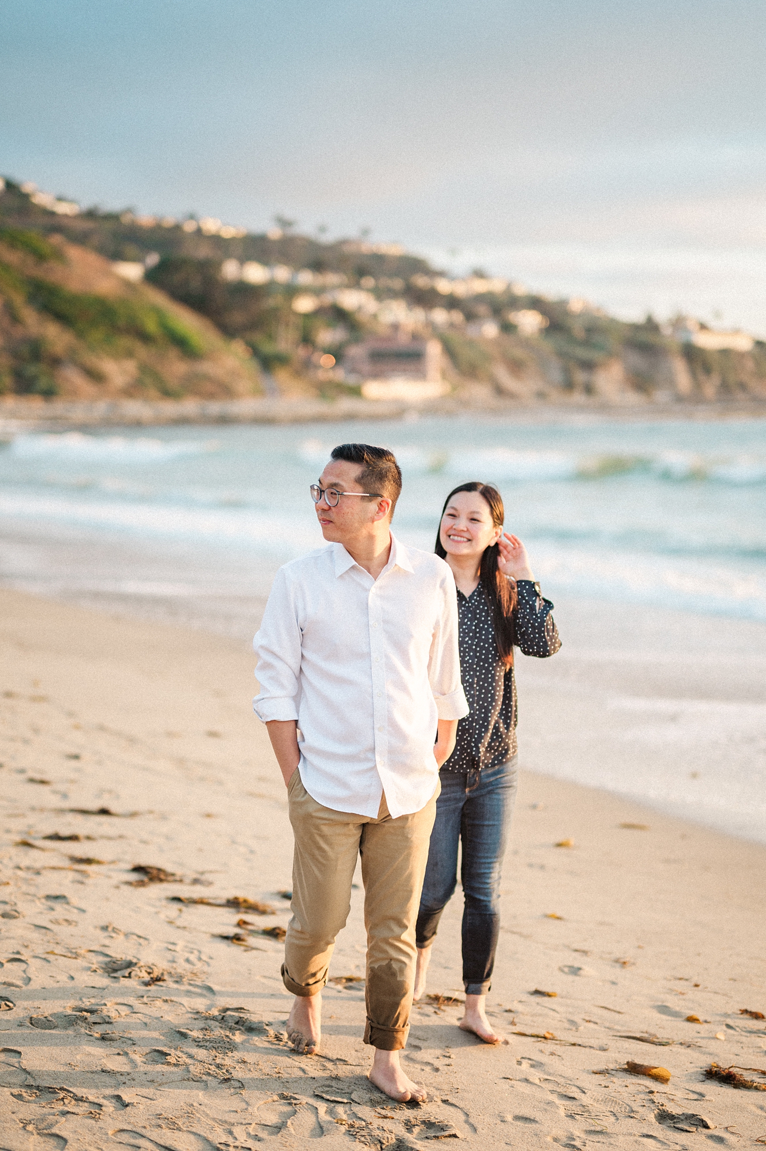 Beach Engagement Session with beautiful clouds and sunset -47.jpg
