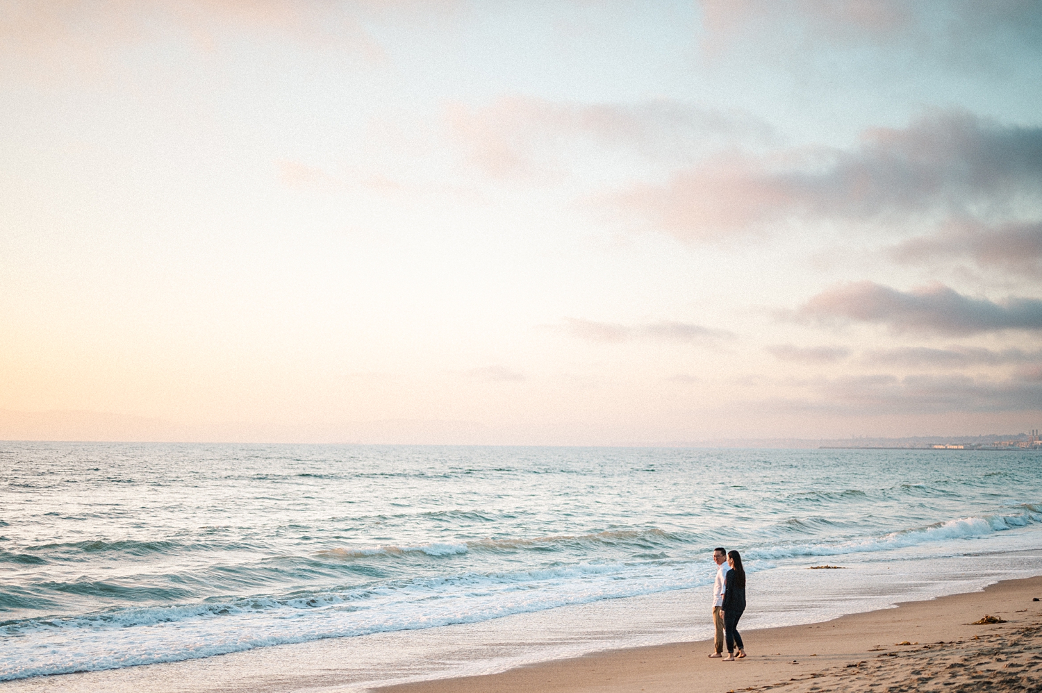 Beach Engagement Session with beautiful clouds and sunset -51.jpg
