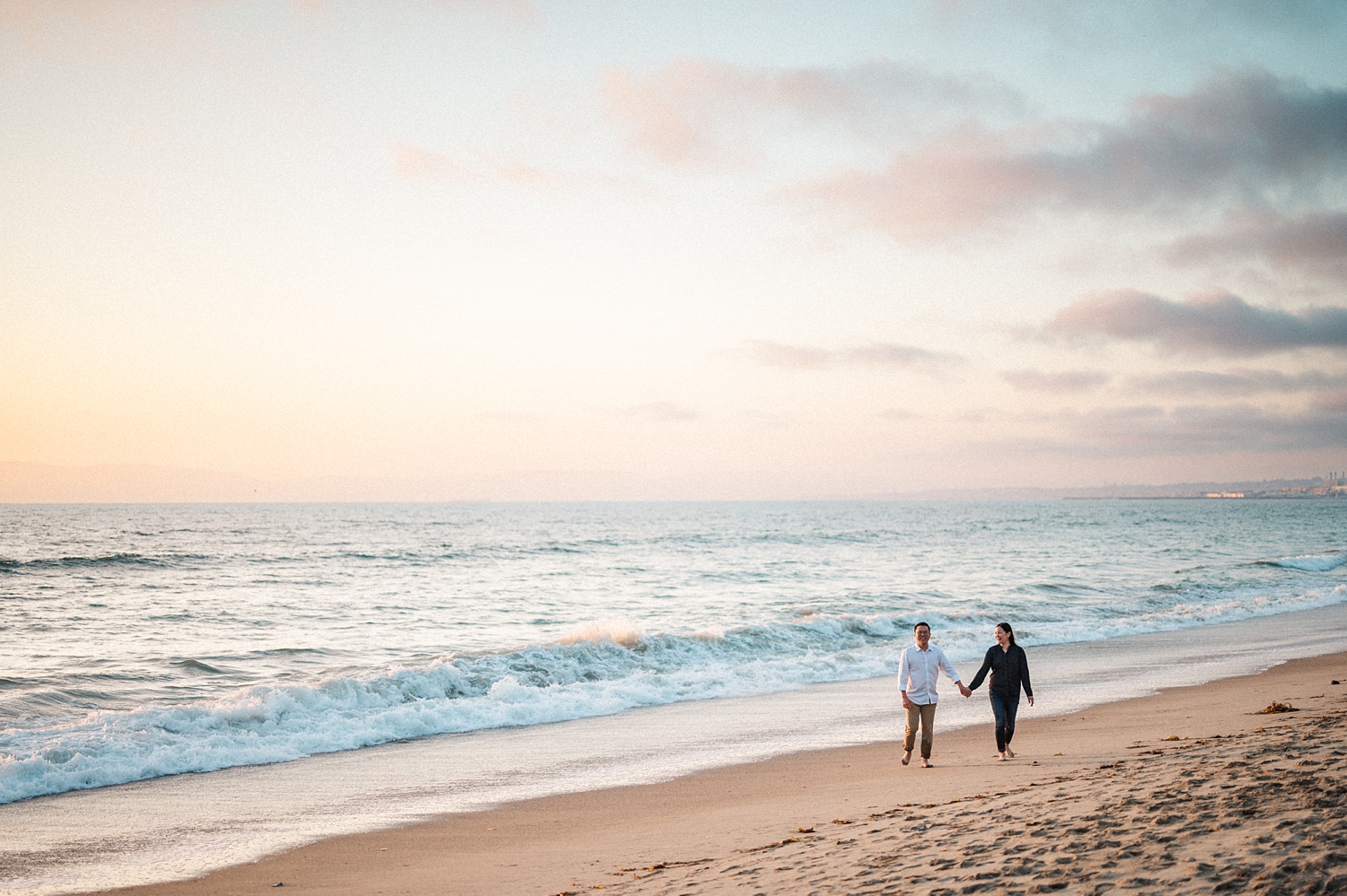 Beach Engagement Session with beautiful clouds and sunset -52.jpg