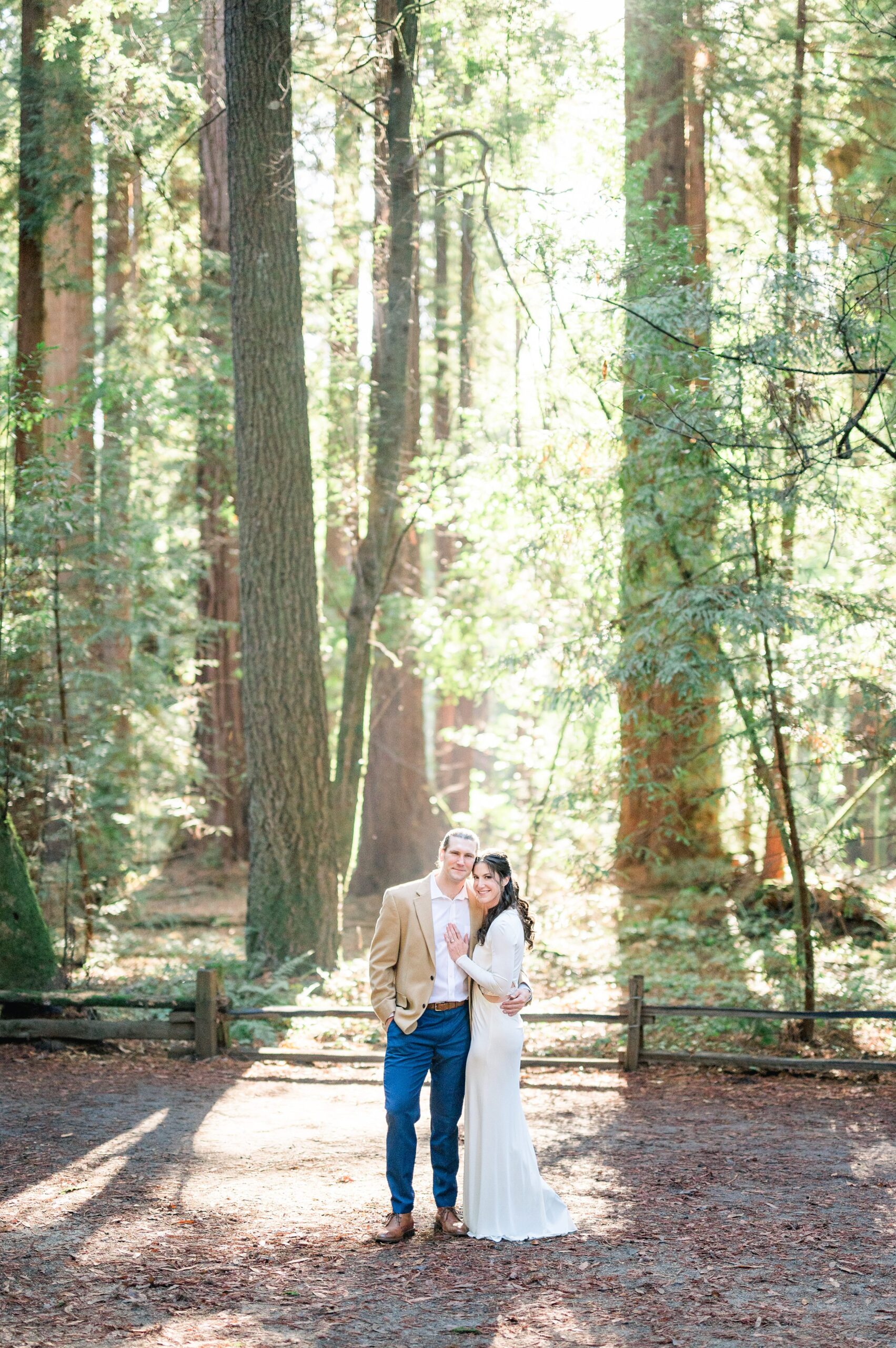 engagement session at the redwoods in a white dress